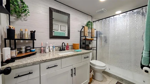 a outdoor living room with furniture and a window