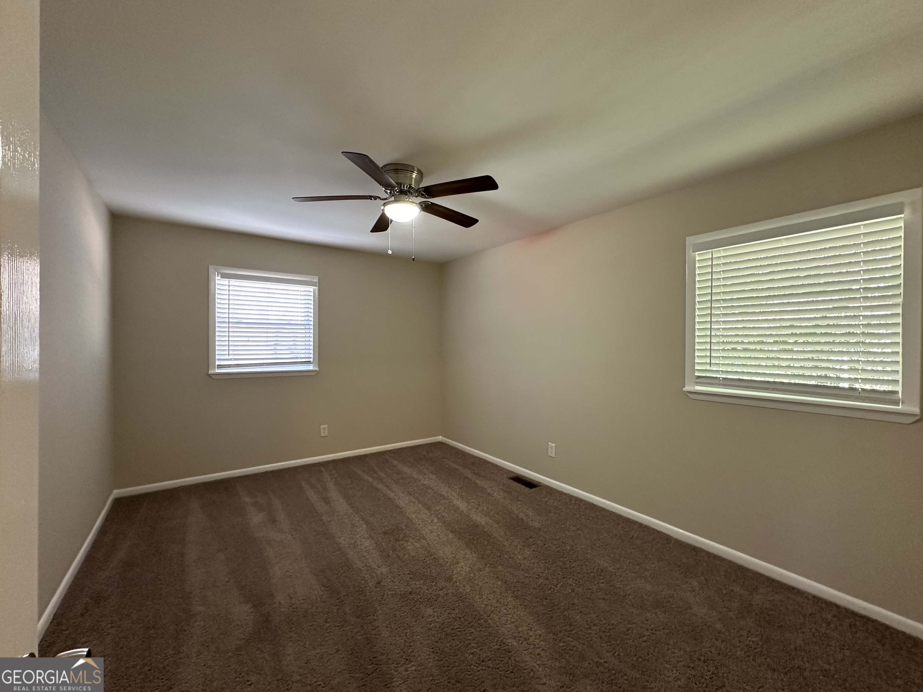1154 Penn Court Southeast Atlanta, GA 30315 - Photo 6 of 9 an empty room with a window