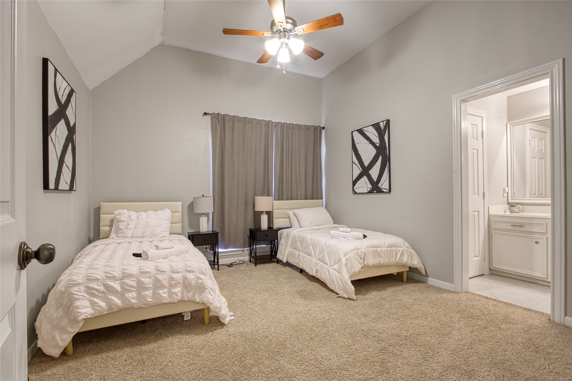 6782 Cutten Parkway Houston, TX 77069 - Photo 13 of 20 a bed room with a bed and a chandelier