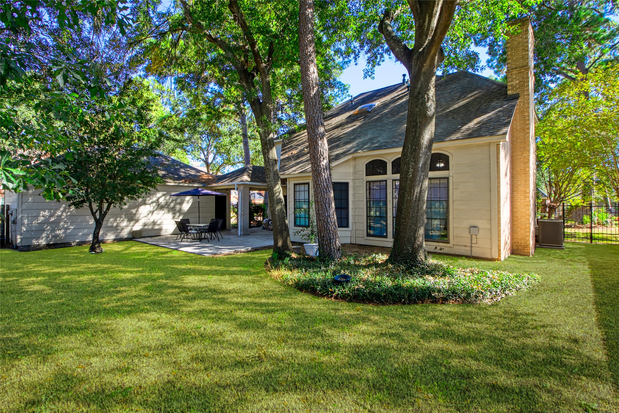 6782 Cutten Parkway Houston, TX 77069 - Photo 18 of 20 a view of a house with a back yard
