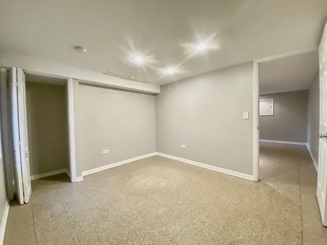 a bathroom with a sink a mirror and a toilet