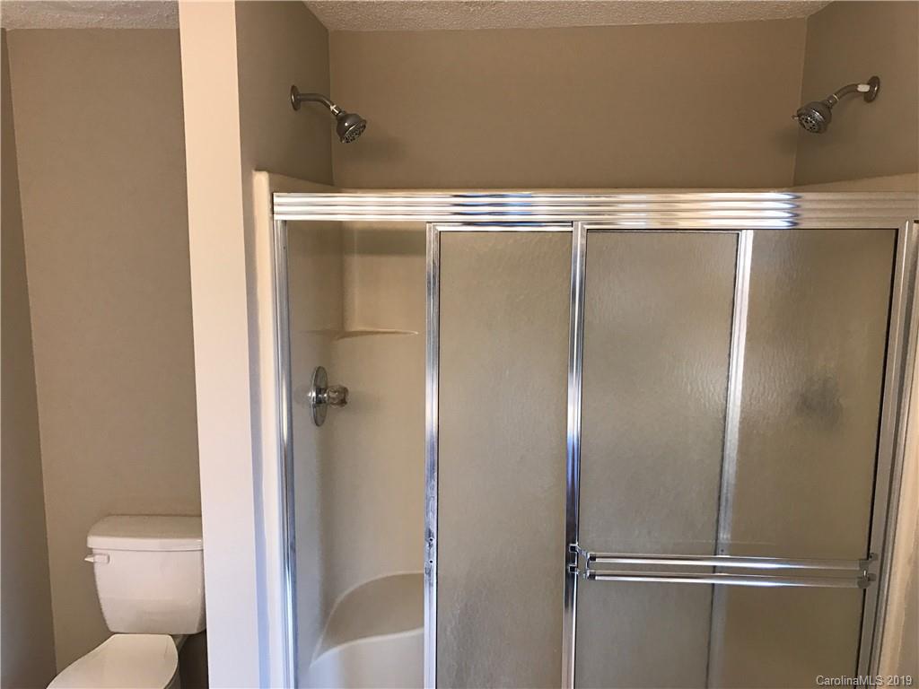 1221 Gold Hill Road Fort Mill, SC 29708 - Photo 11 of 32 a bathroom with a glass door shower