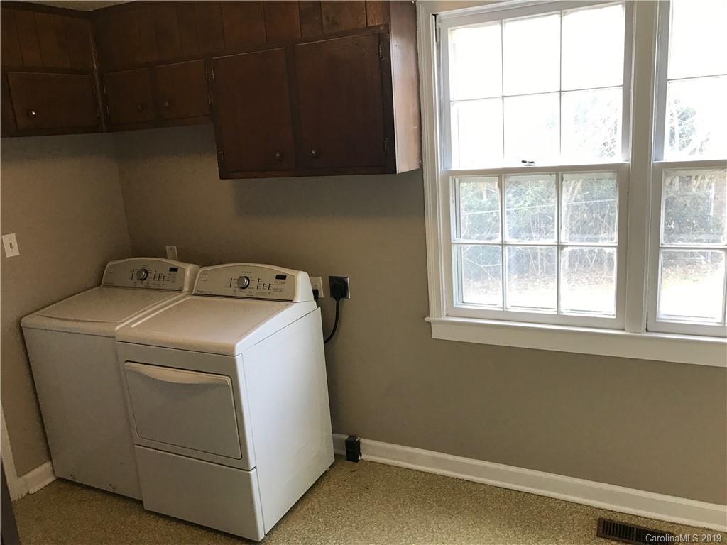 1221 Gold Hill Road Fort Mill, SC 29708 - Photo 24 of 32 a utility room with dryer and washer