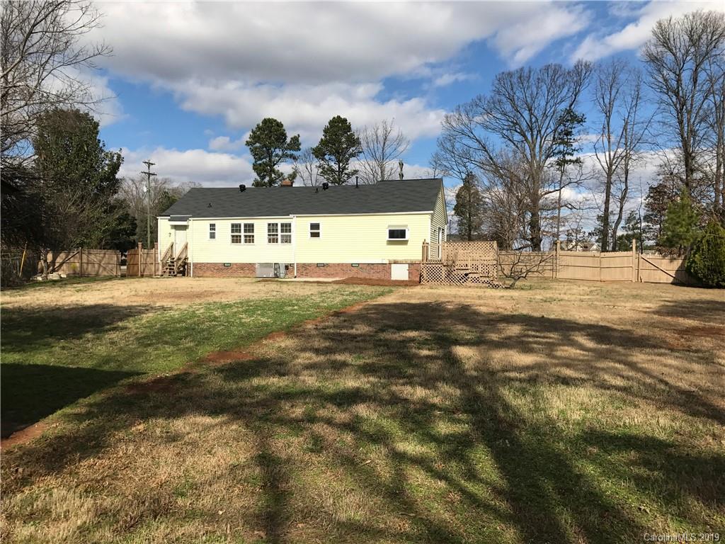 1221 Gold Hill Road Fort Mill, SC 29708 - Photo 29 of 32 a view of a yard with some trees
