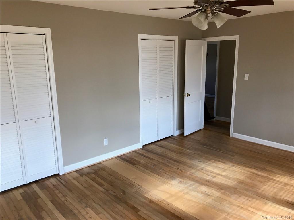1221 Gold Hill Road Fort Mill, SC 29708 - Photo 8 of 32 a view of empty room with wooden floor