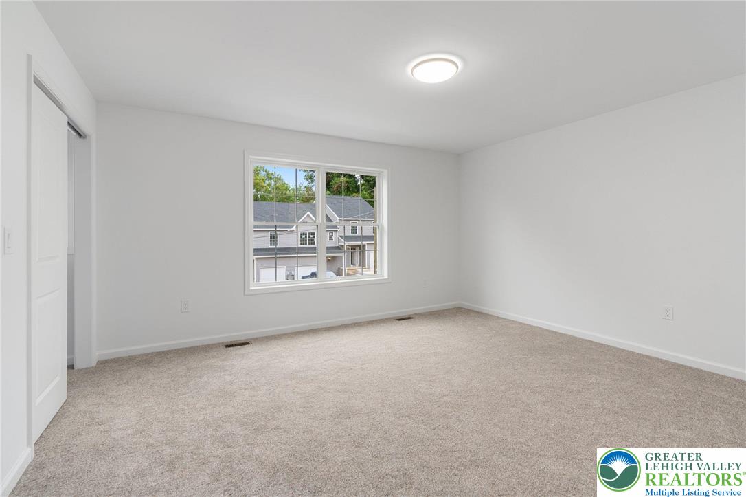 306 Barber Street, Unit LOT 39 Allentown, PA 18103 - Photo 21 of 30 an empty room with windows