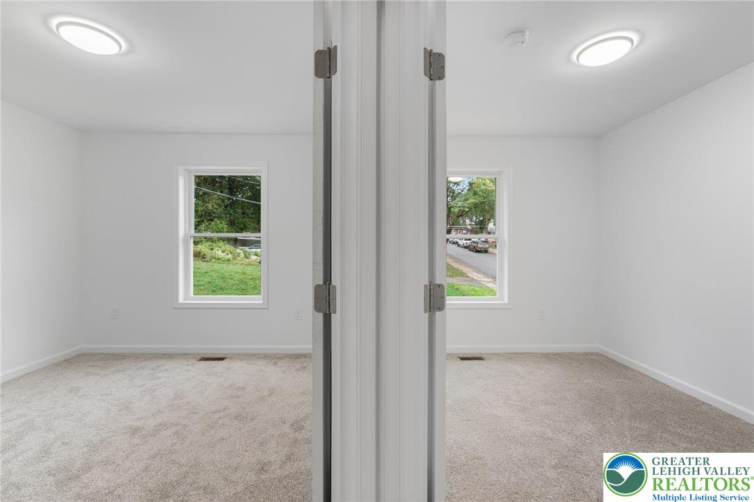 306 Barber Street, Unit LOT 39 Allentown, PA 18103 - Photo 24 of 30 an empty room with windows
