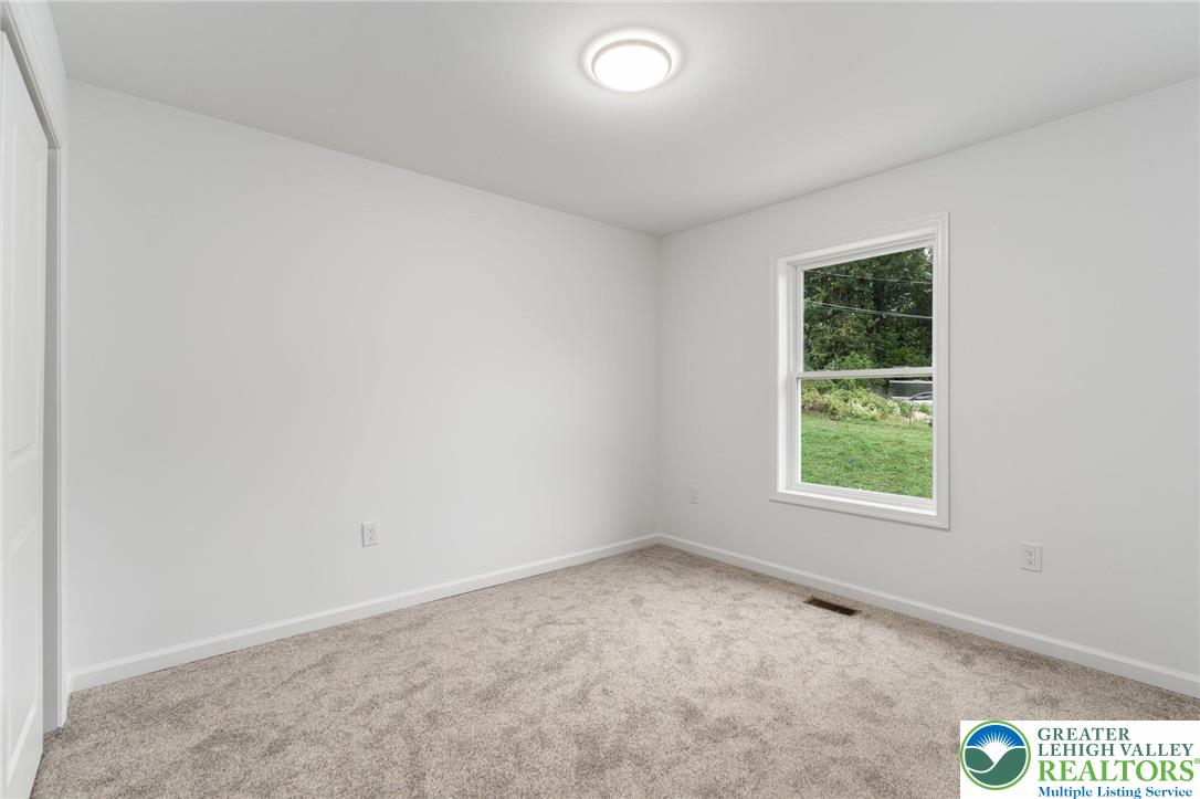 306 Barber Street, Unit LOT 39 Allentown, PA 18103 - Photo 25 of 30 an empty room with a window
