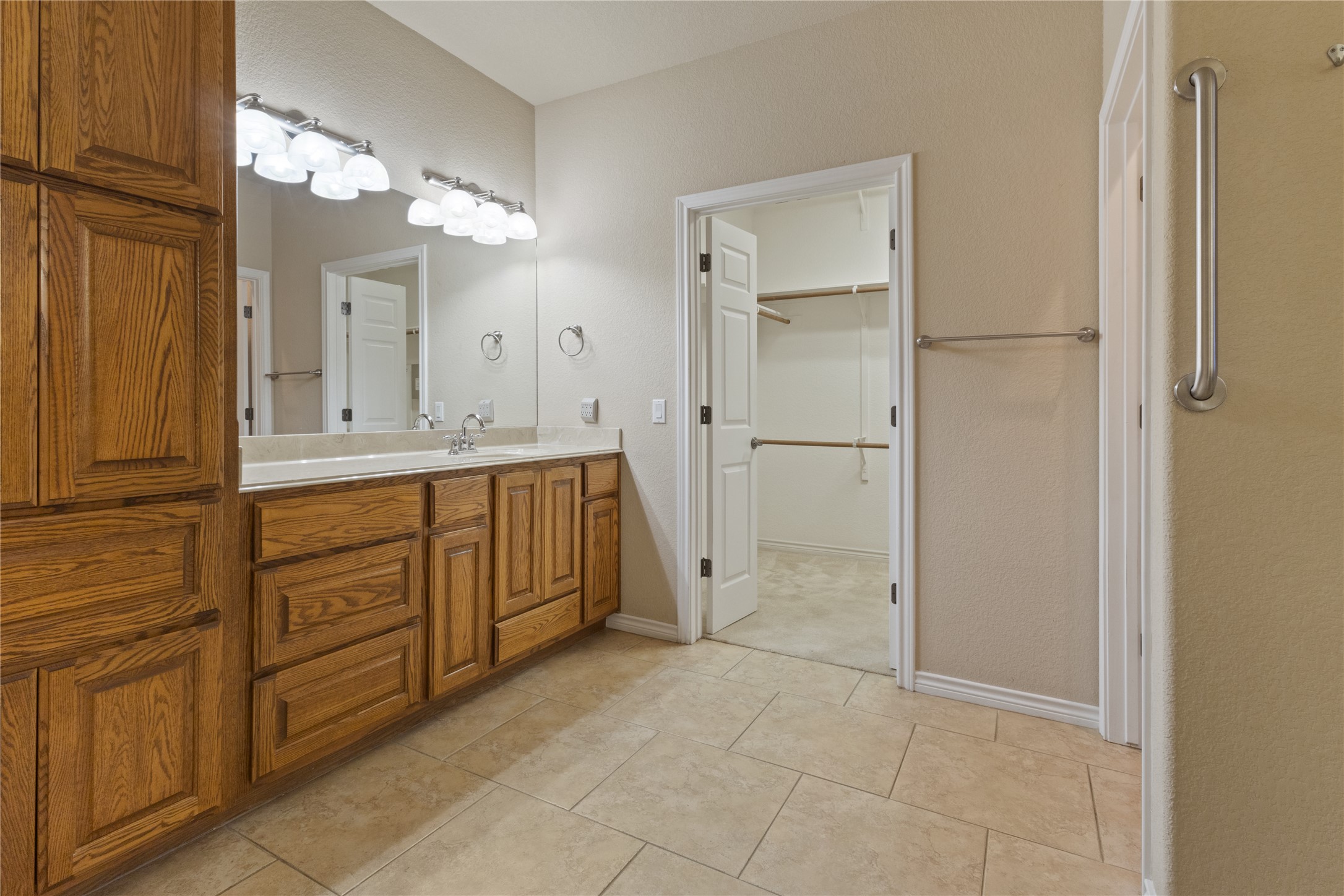1005 Fort Davis Street Georgetown, TX 78633 - Photo 13 of 38 Extra counter space and storage in this master bath.
