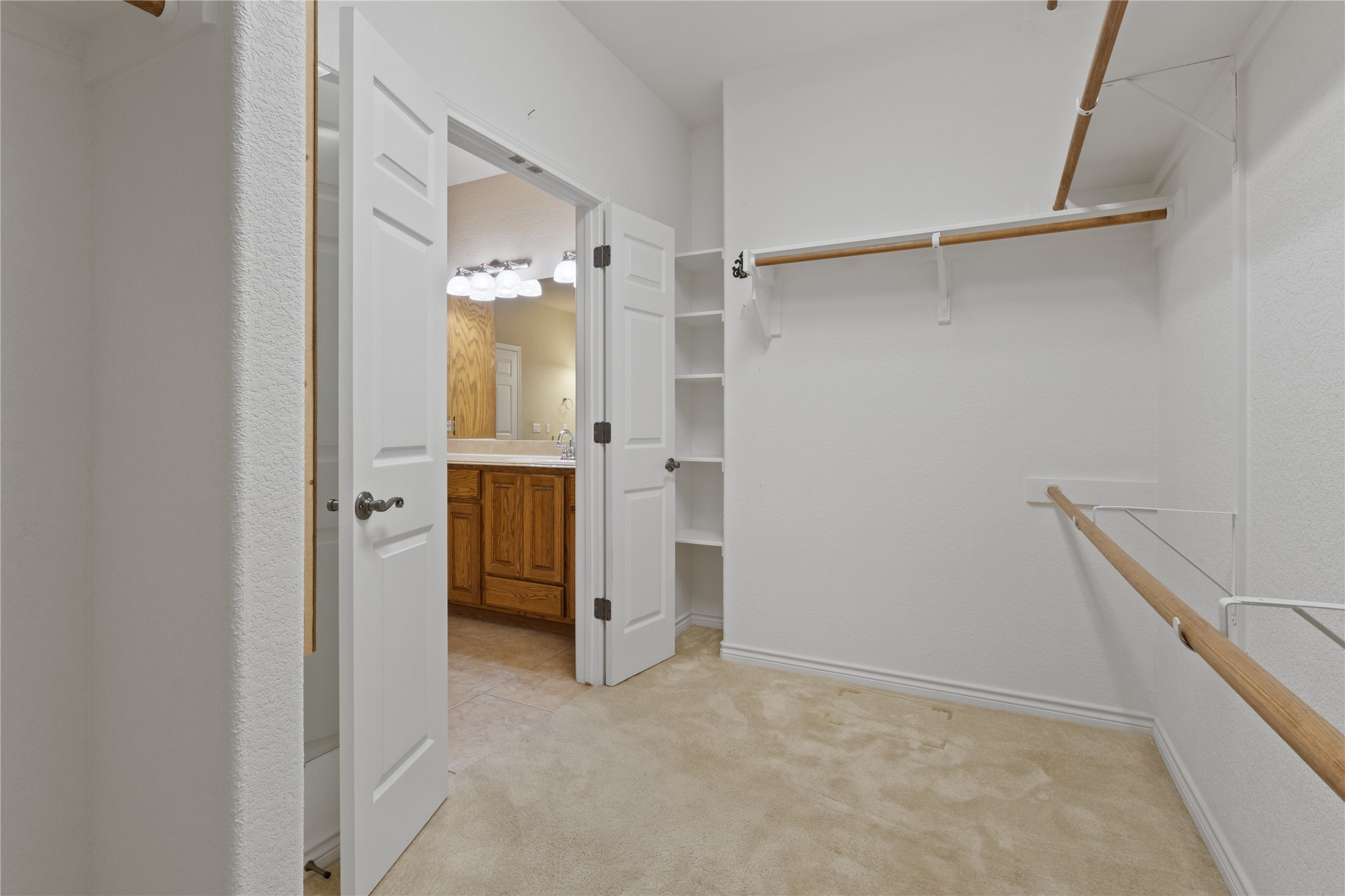 1005 Fort Davis Street Georgetown, TX 78633 - Photo 16 of 38 Master closet with some builtins.