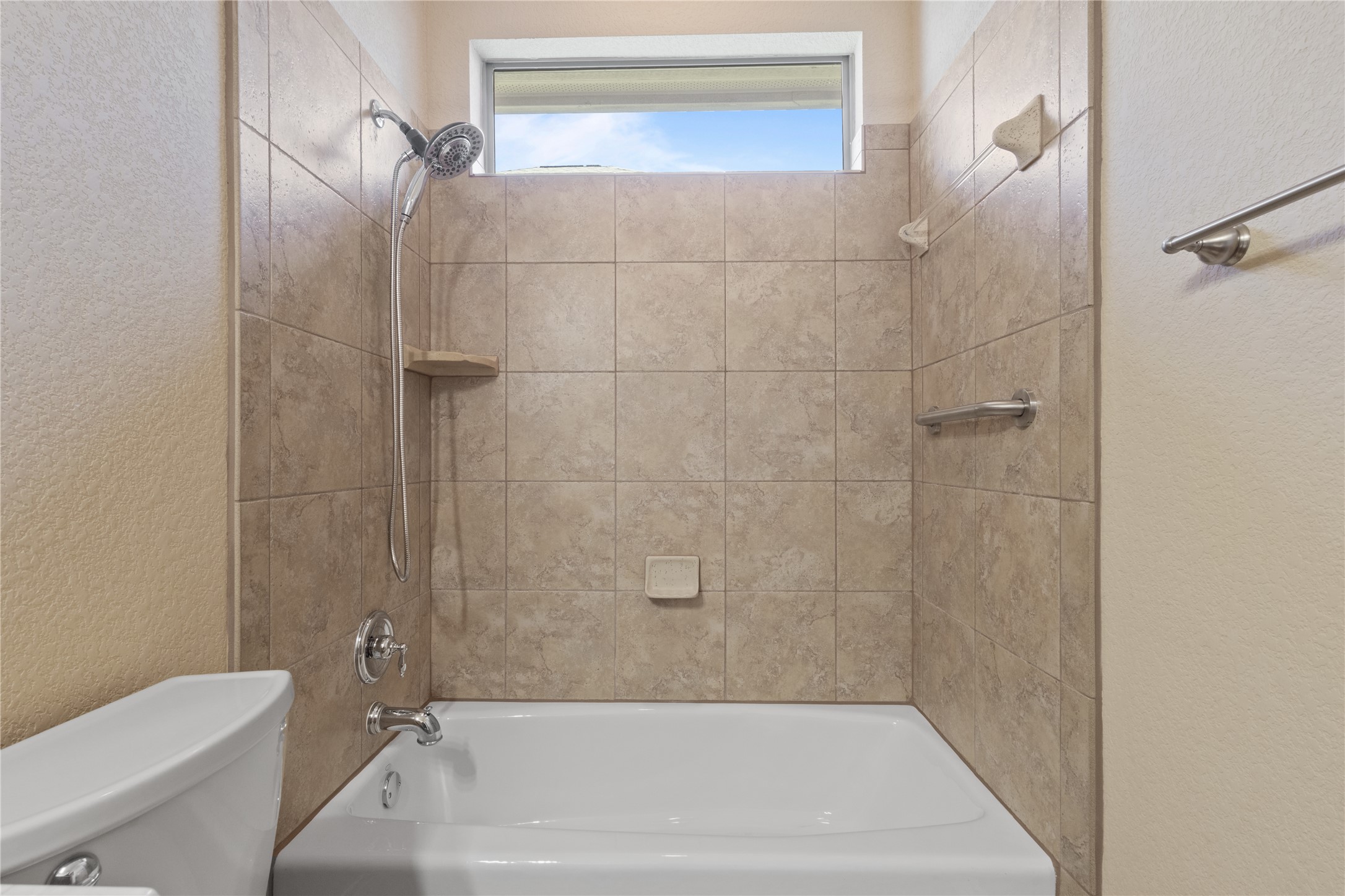 1005 Fort Davis Street Georgetown, TX 78633 - Photo 18 of 38 Tile shower and handy grab bar.