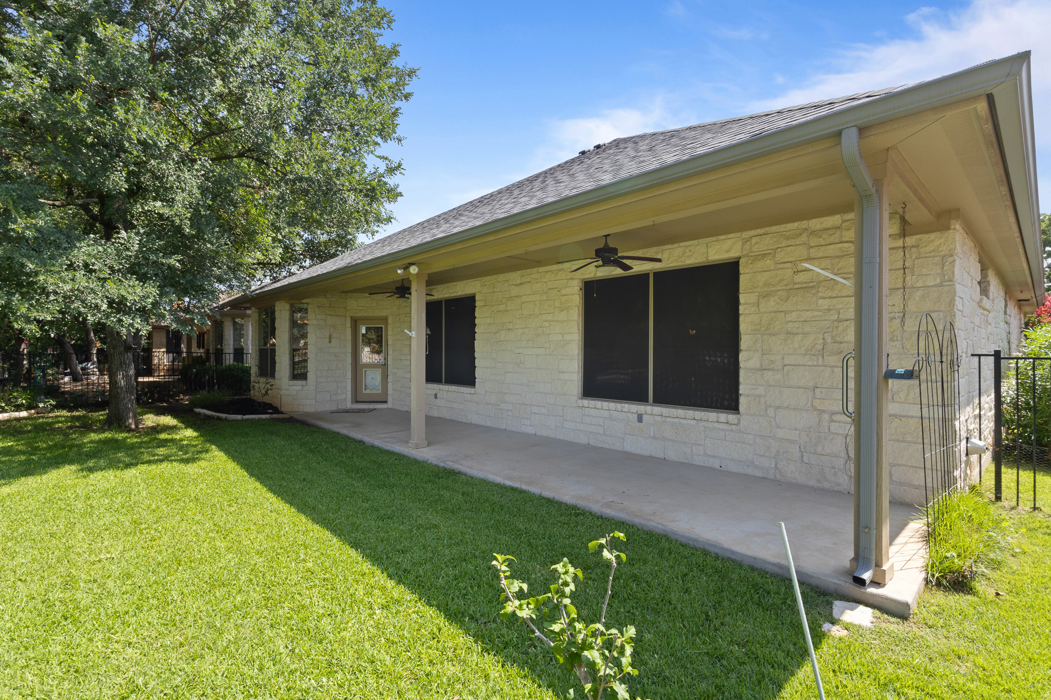1005 Fort Davis Street Georgetown, TX 78633 - Photo 24 of 38 Extra long patio with solar screens on the windows.