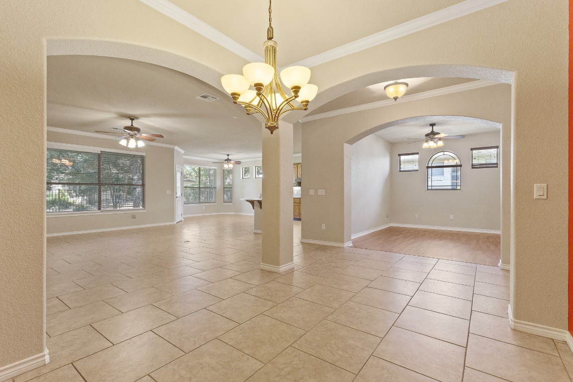 1005 Fort Davis Street Georgetown, TX 78633 - Photo 37 of 38 a view of a hallway with chandelier and glass door