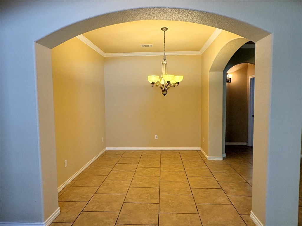 1005 Fort Davis Street Georgetown, TX 78633 - Photo 7 of 38 a view of a hallway with a chandelier