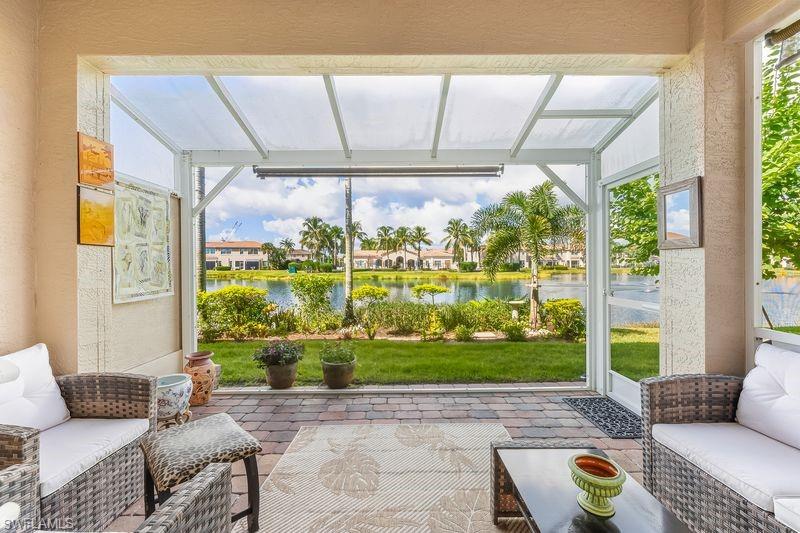 a living room with furniture and a yard
