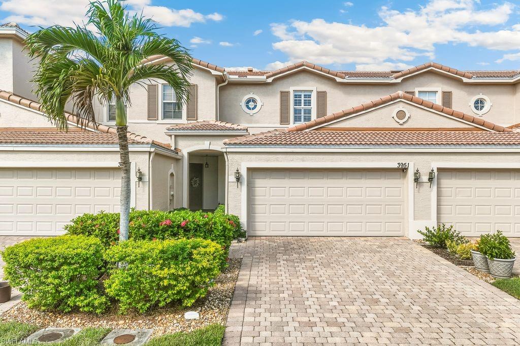 3951 Cherrybrook Loop Fort Myers, FL 33966 - Photo 2 of 34 front view of a house with a yard
