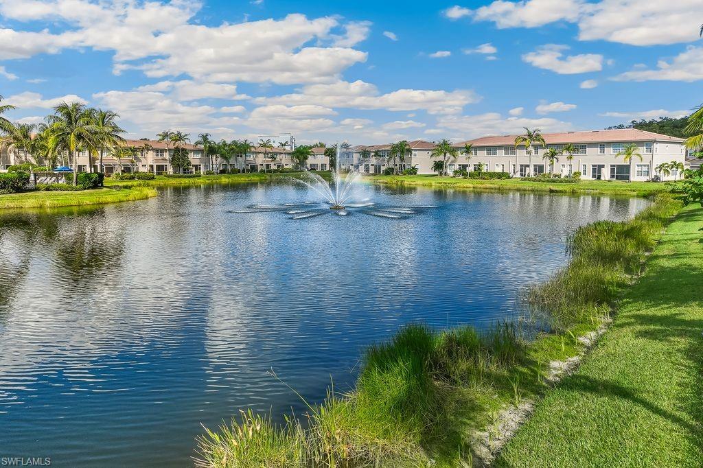 3951 Cherrybrook Loop Fort Myers, FL 33966 - Photo 22 of 34 a view of a lake with boats and trees in the background