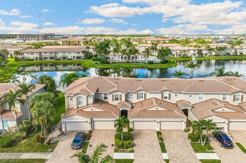 3951 Cherrybrook Loop Fort Myers, FL 33966 - Photo 33 of 34 an aerial view of a house with a yard