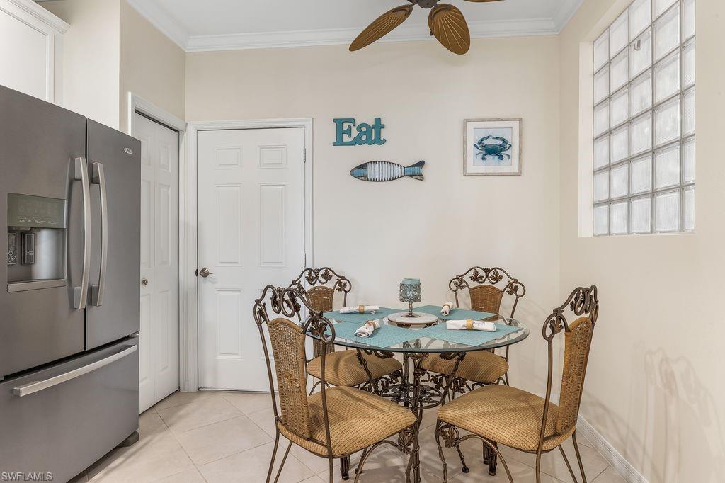 3951 Cherrybrook Loop Fort Myers, FL 33966 - Photo 5 of 34 a dining room with furniture and window
