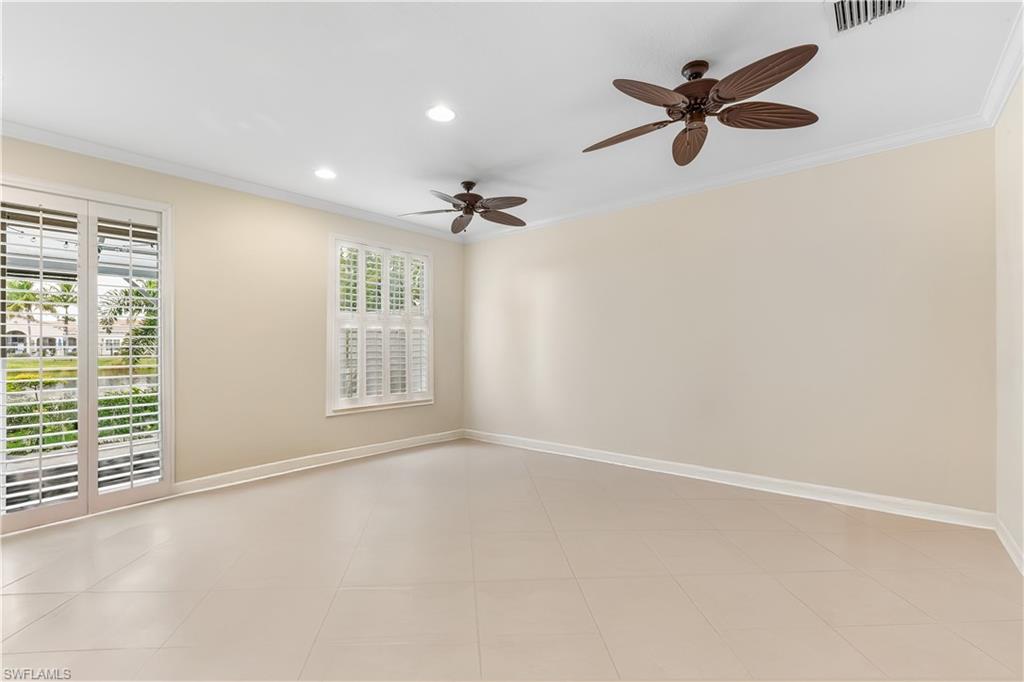 3951 Cherrybrook Loop Fort Myers, FL 33966 - Photo 7 of 34 a view of a livingroom with a ceiling fan and window