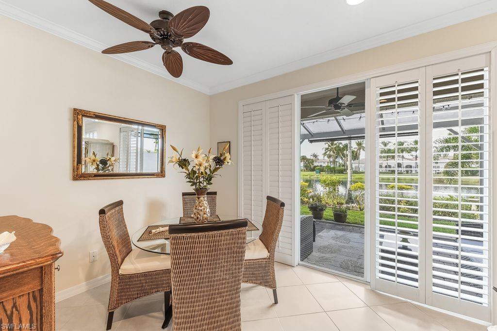 3951 Cherrybrook Loop Fort Myers, FL 33966 - Photo 10 of 34 a dining room with furniture and window