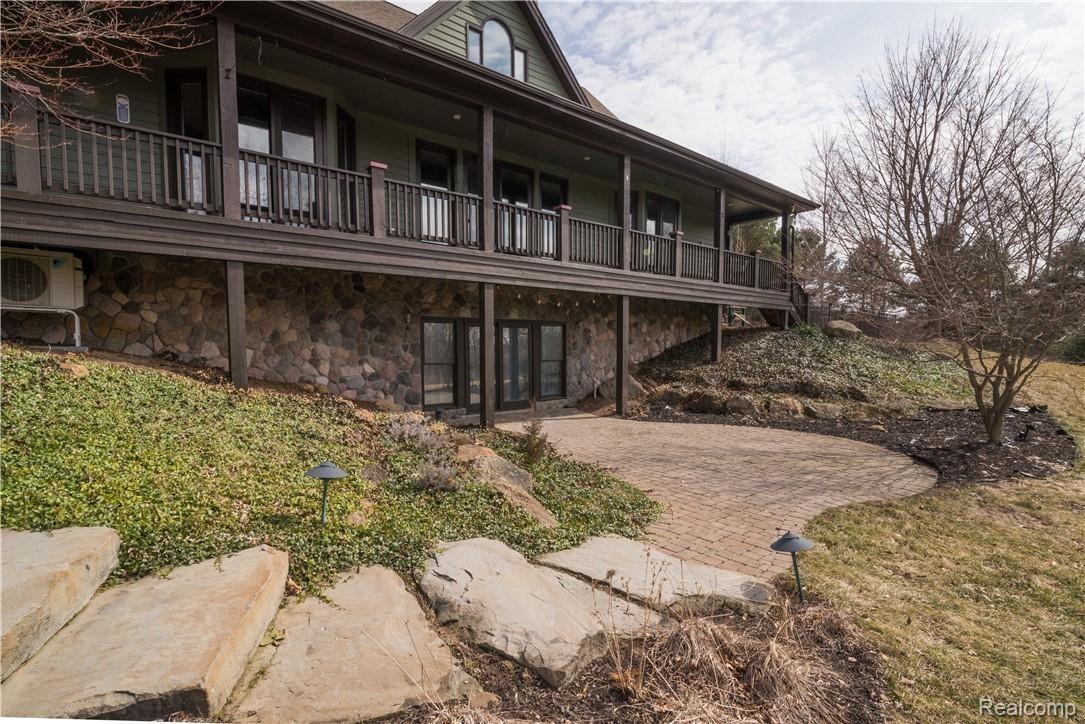 4760 Winding Way Howell, MI 48843 - Photo 5 of 59 Brick Paver Patio with Stone Steps
