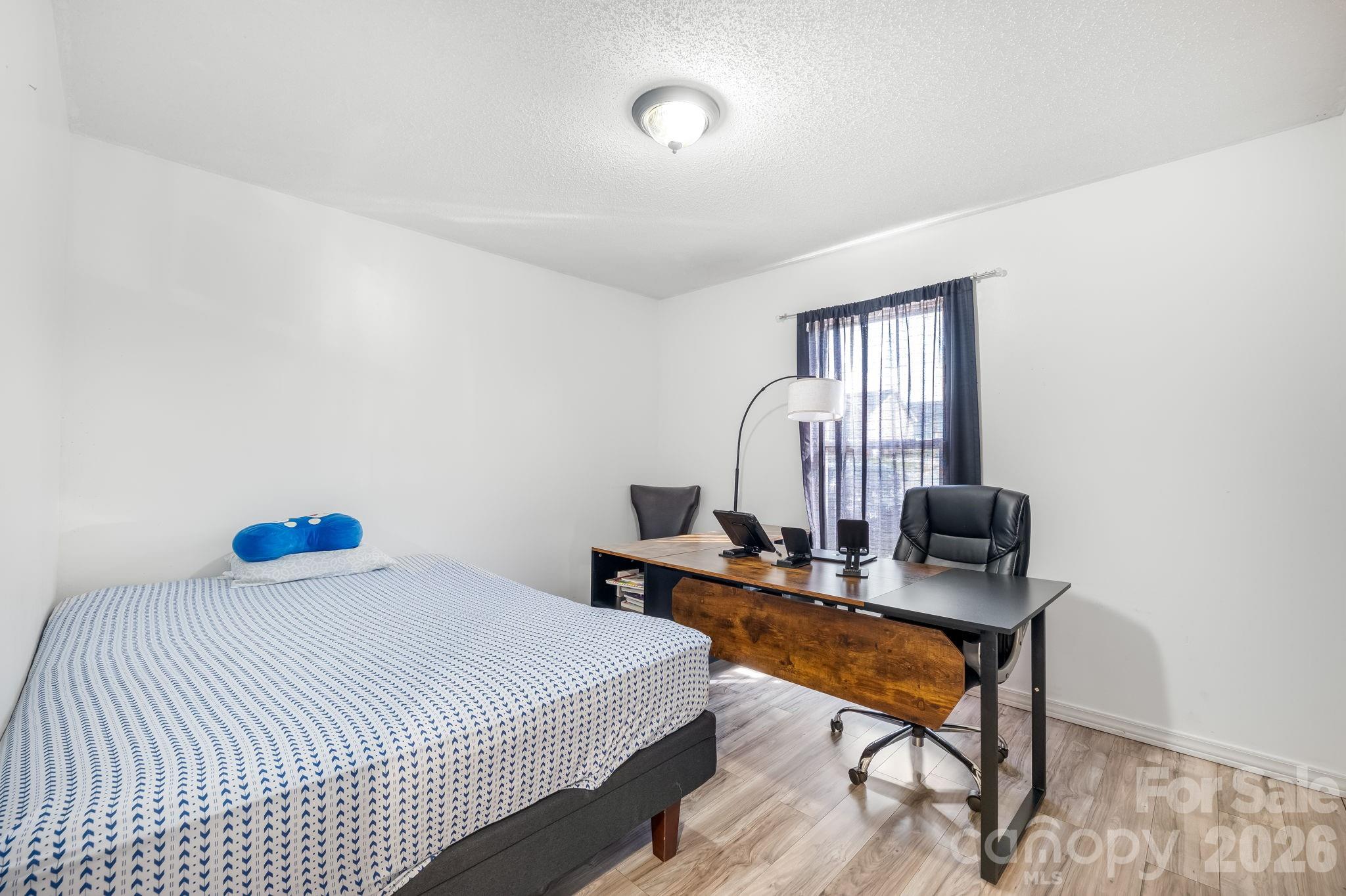 3761 Herman Sipe Road Conover, NC 28613 - Photo 19 of 27 a bedroom with bed and a window