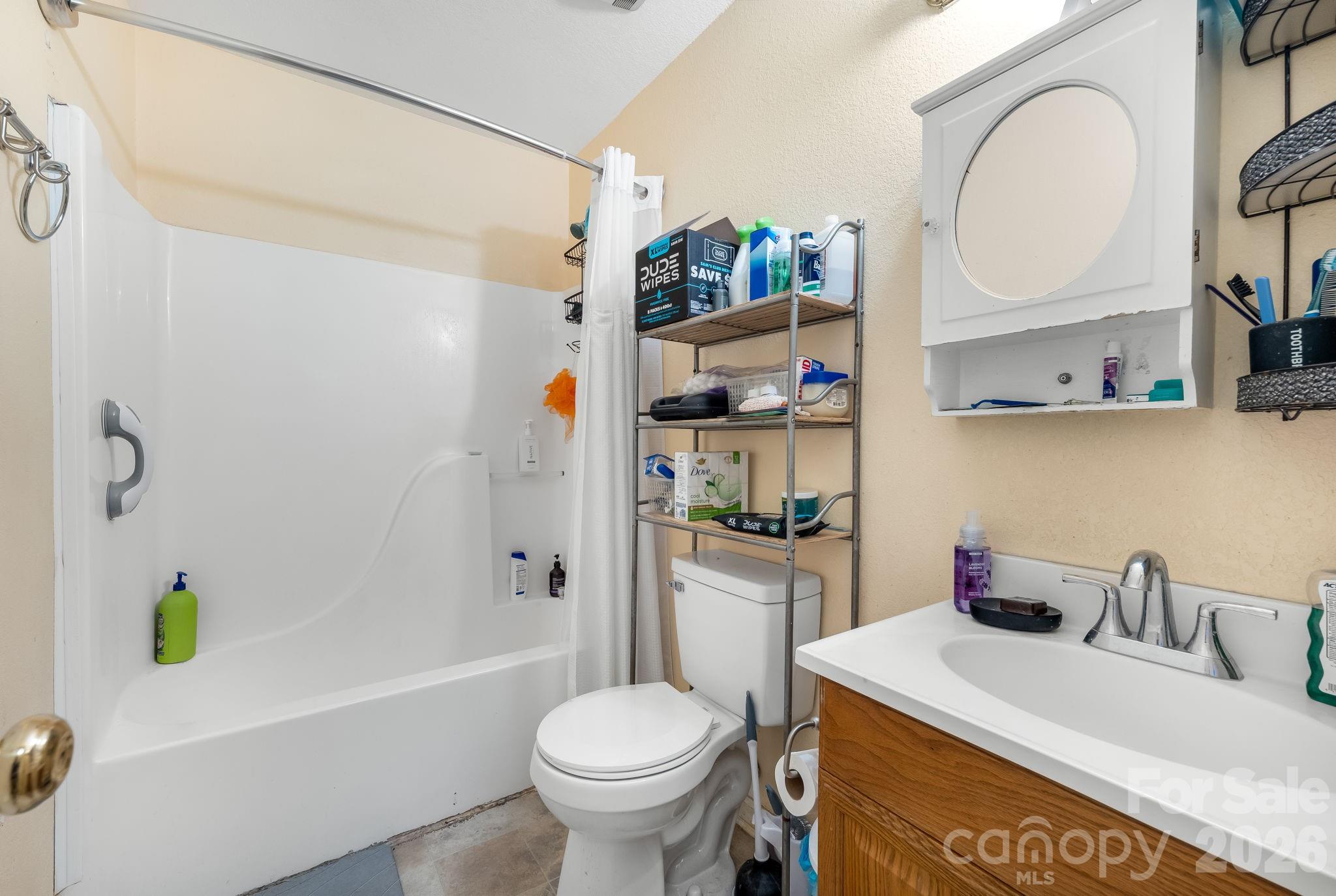 3761 Herman Sipe Road Conover, NC 28613 - Photo 26 of 27 a bathroom with a sink a toilet and a bathtub