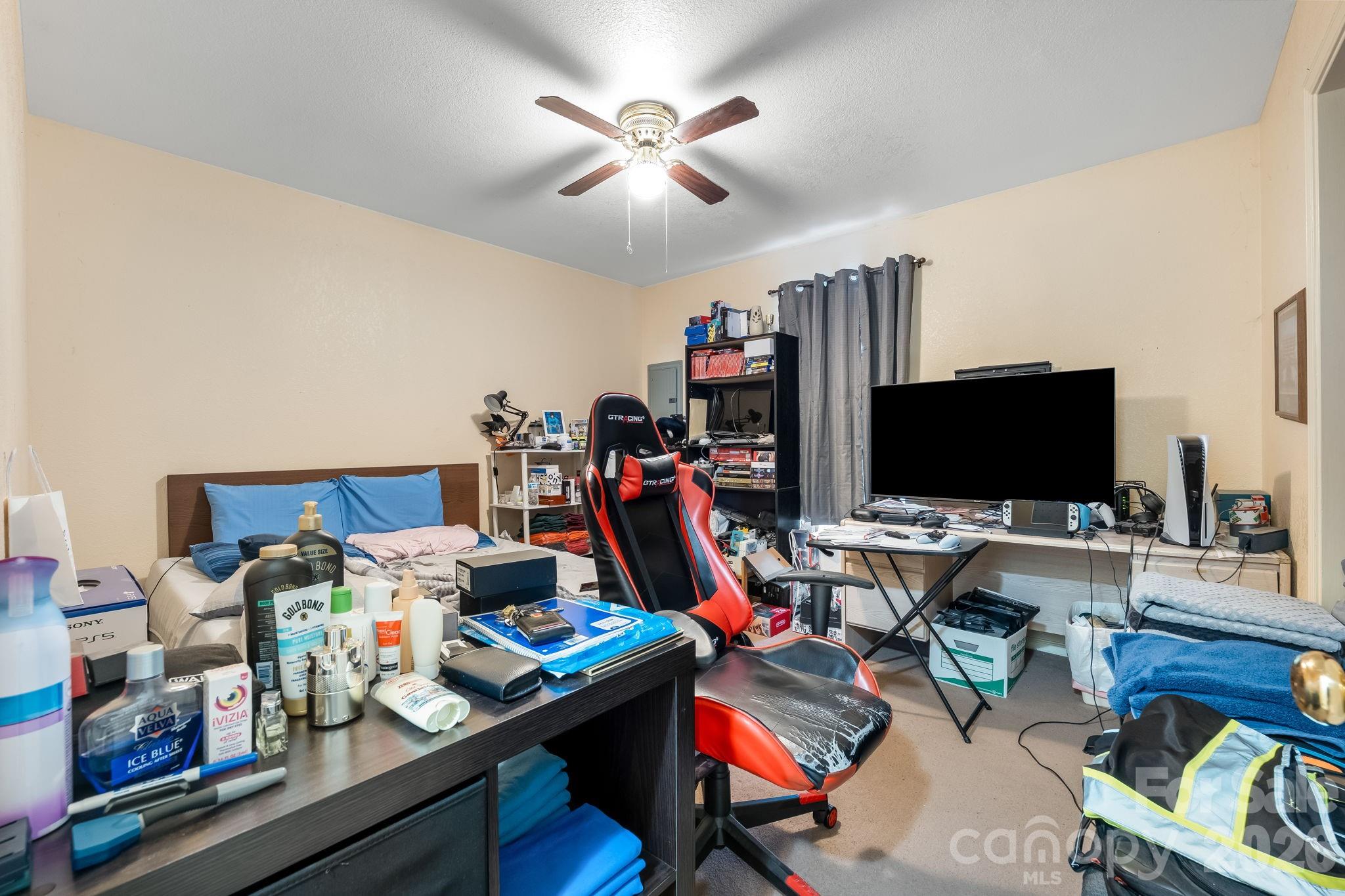 3761 Herman Sipe Road Conover, NC 28613 - Photo 27 of 27 a view of a workspace with furniture and a flat screen tv