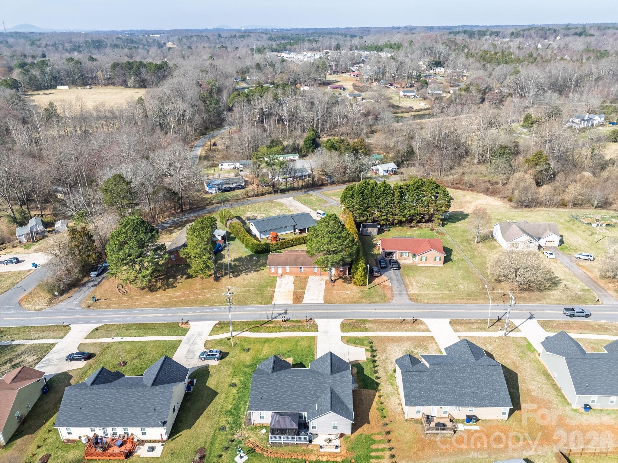 3761 Herman Sipe Road Conover, NC 28613 - Photo 9 of 27 an aerial view of residential houses with outdoor space