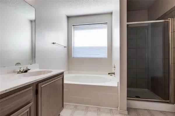 a bathroom with a sink and a bathtub