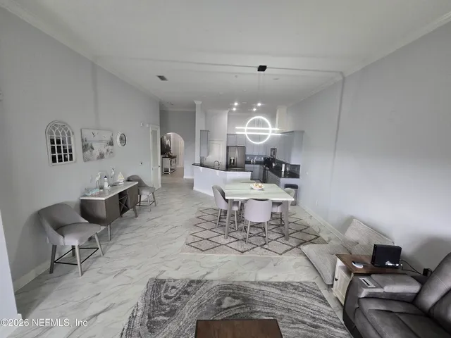 a living room with furniture and a couch