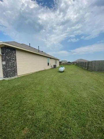 a view of a ocean with a big yard
