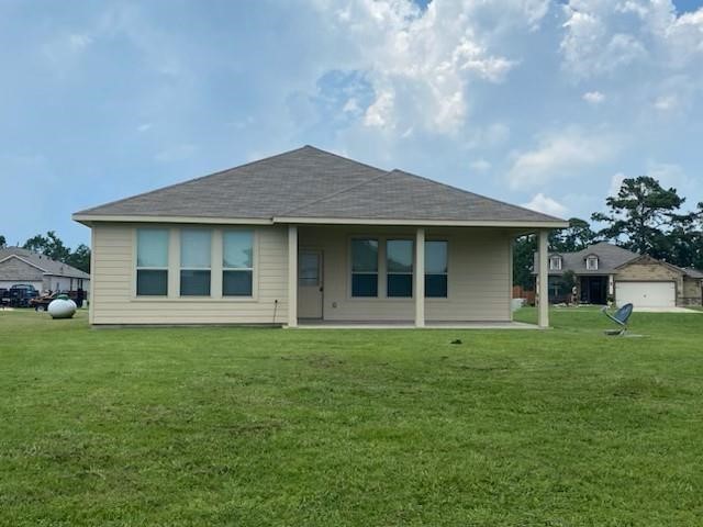 1435 Alice Drive Beaumont, TX 77705 - Photo 9 of 11 a house view with a garden space