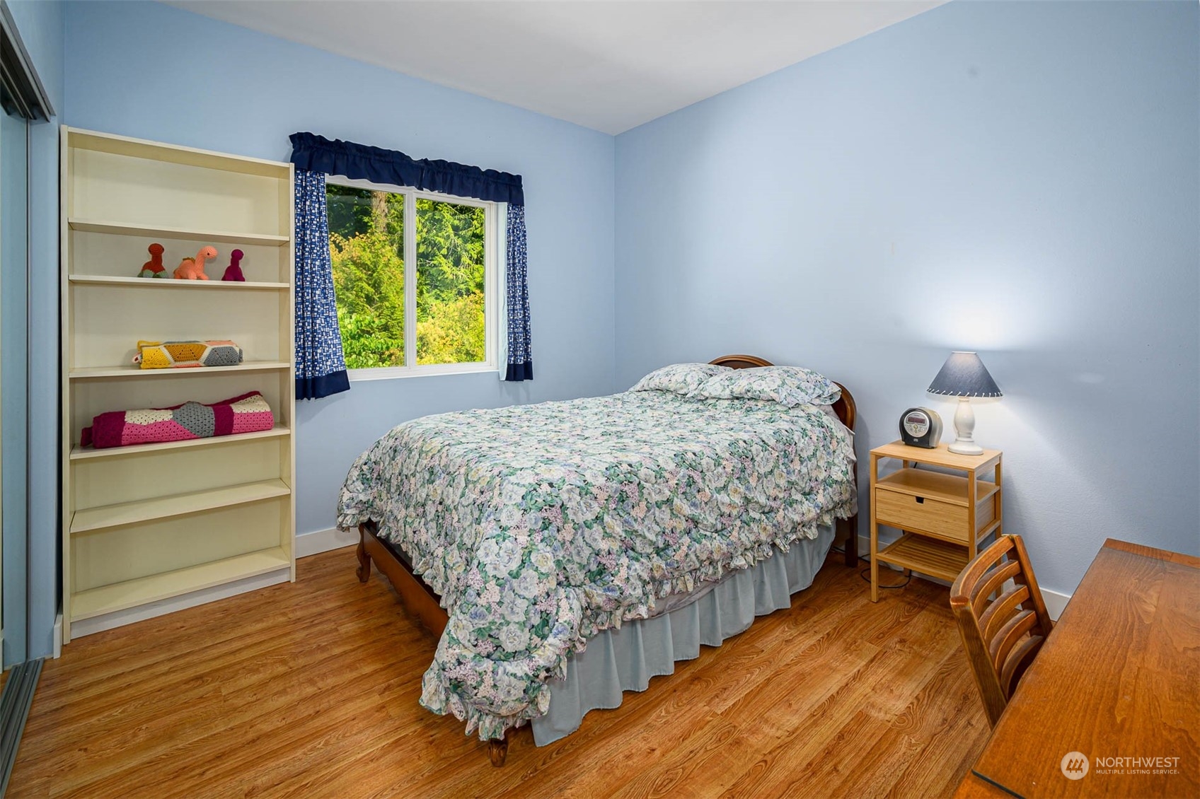 10602 Southwest Cove Road Vashon, WA 98070 - Photo 29 of 38 a bedroom with a bed and a window