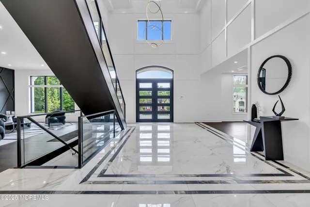 a living room with fireplace furniture and a flat screen tv