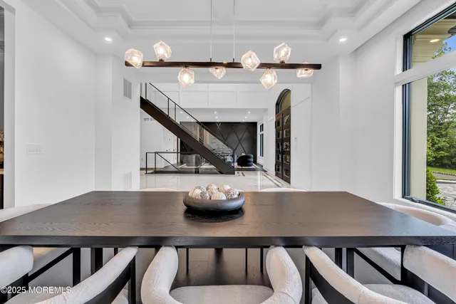 a bedroom with a bed and a table