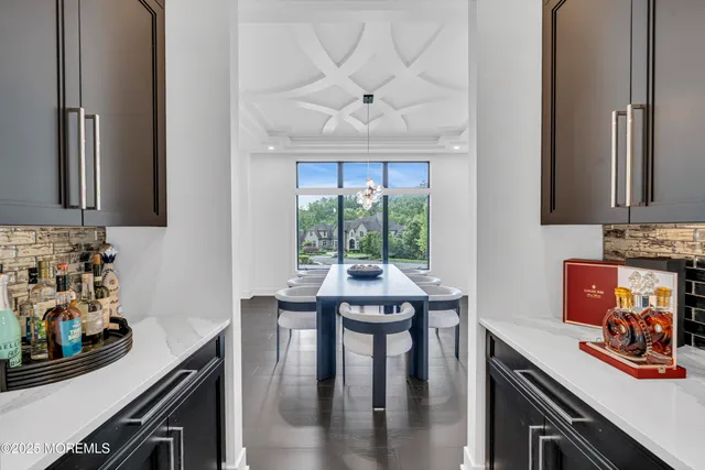 a utility room with sink dryer and washer