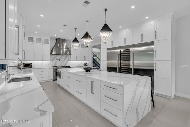 an aerial view of a house with a garden