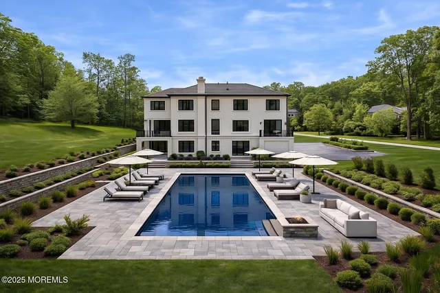 a view of a a dining room with furniture window and wooden floor