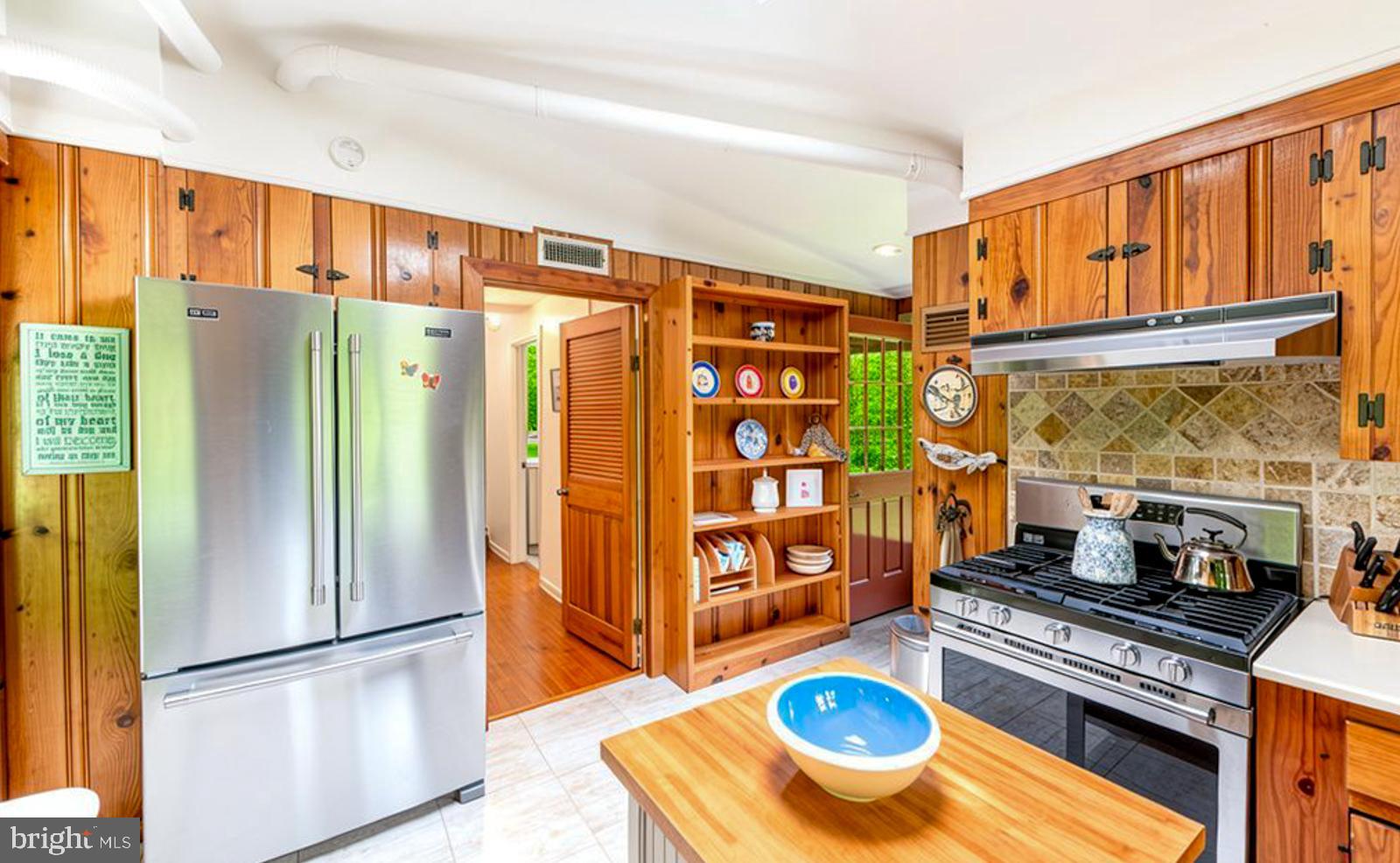 222 Blue School Road Perkasie, PA 18944 - Photo 11 of 77 a kitchen with stainless steel appliances granite countertop a refrigerator and a stove