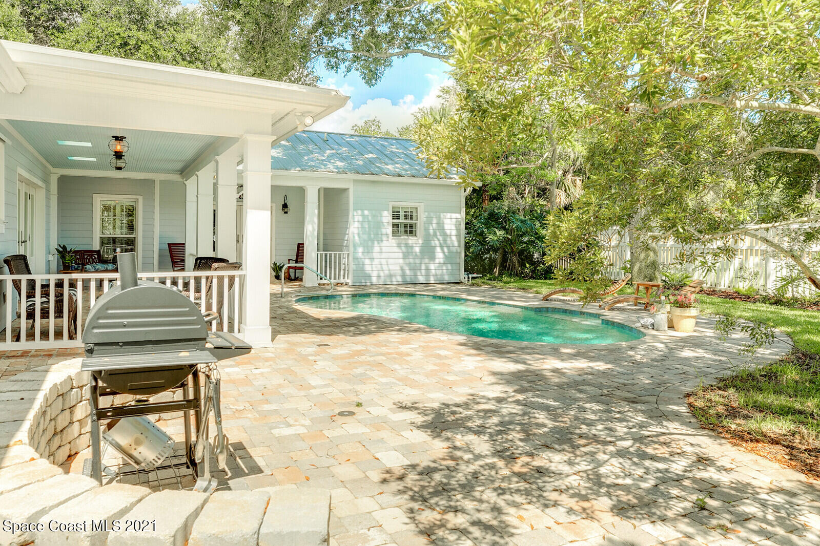 200 Melbourne Avenue Indialantic, FL 32903 - Photo 12 of 62 a view of a house with backyard and sitting area