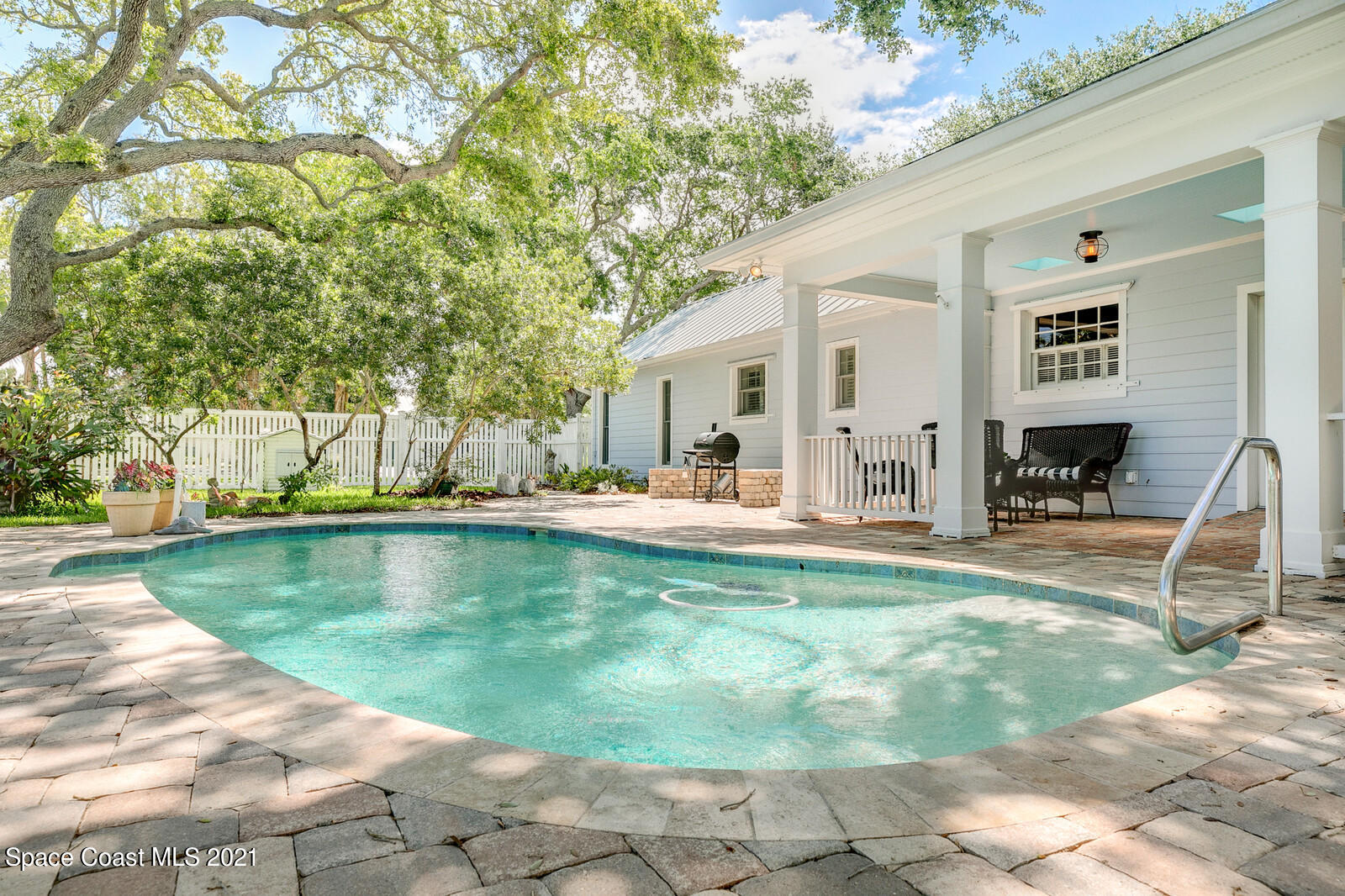 200 Melbourne Avenue Indialantic, FL 32903 - Photo 14 of 62 a view of a house with backyard and a tree