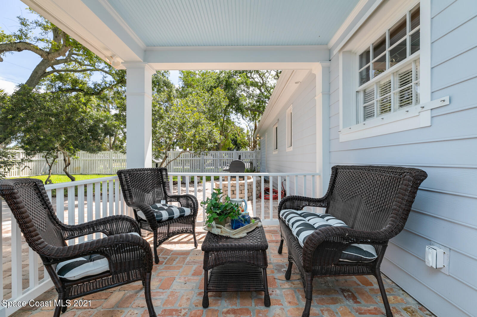 200 Melbourne Avenue Indialantic, FL 32903 - Photo 16 of 62 a view of a chairs and table in the patio
