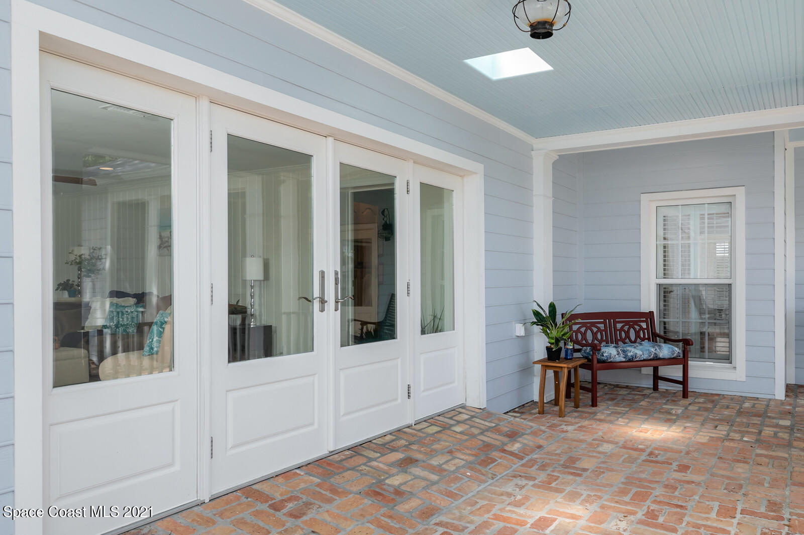 200 Melbourne Avenue Indialantic, FL 32903 - Photo 17 of 62 a living room with furniture and a large window