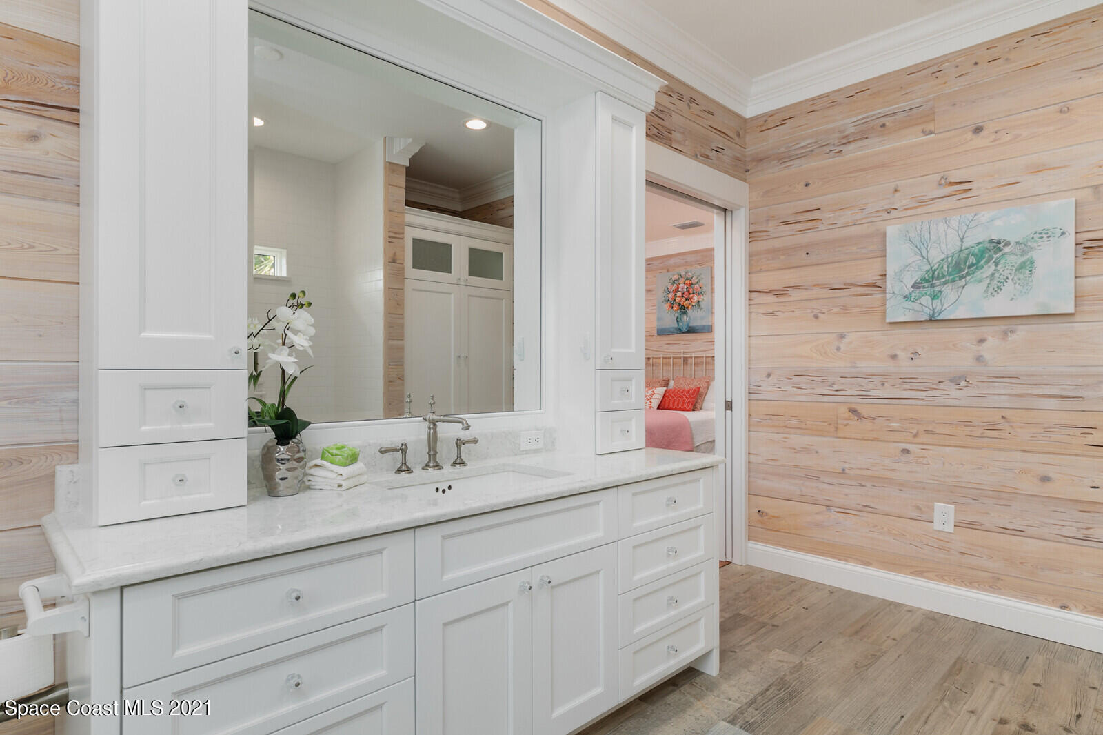 200 Melbourne Avenue Indialantic, FL 32903 - Photo 21 of 62 a bathroom with a sink and a mirror