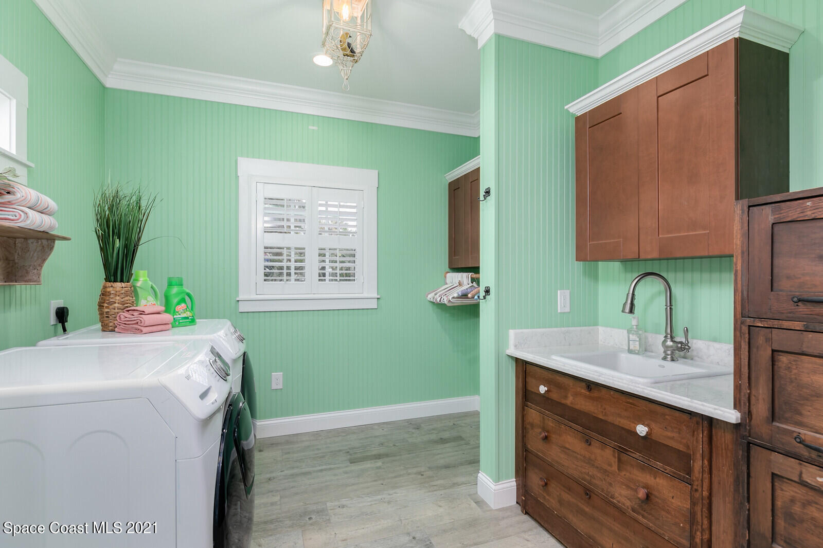 200 Melbourne Avenue Indialantic, FL 32903 - Photo 24 of 62 a bathroom with a sink and a mirror
