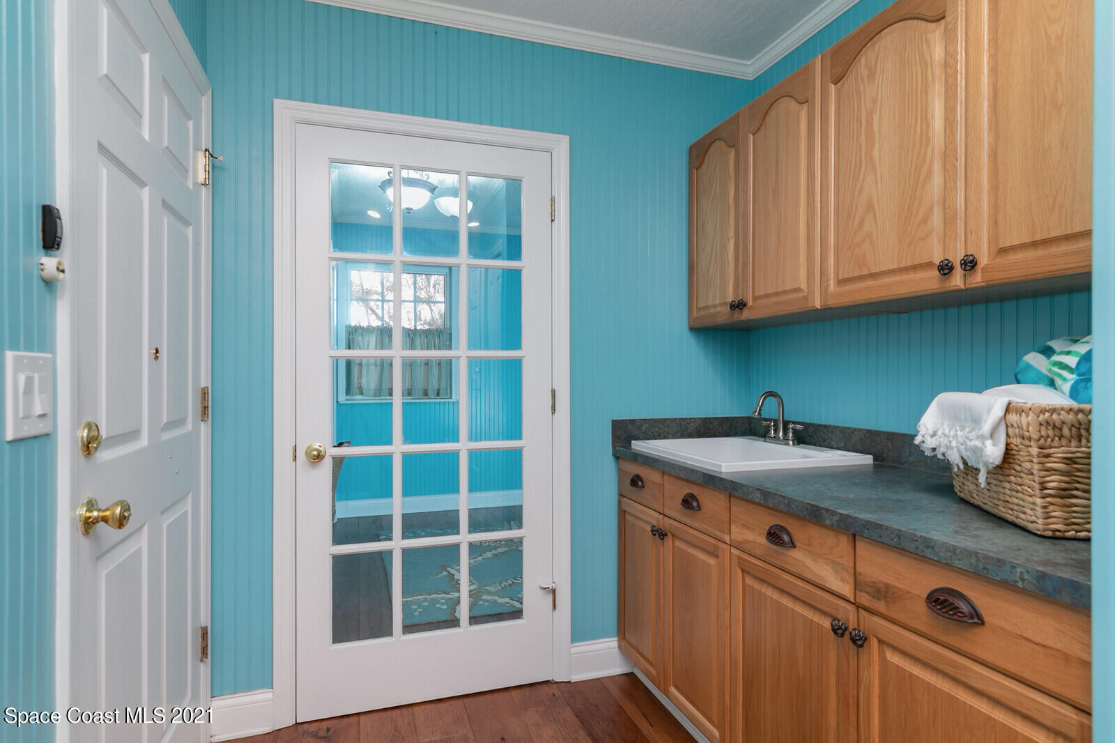 200 Melbourne Avenue Indialantic, FL 32903 - Photo 26 of 62 a kitchen with granite countertop a sink a stove and cabinets
