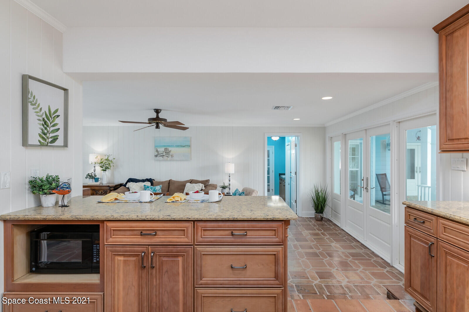 200 Melbourne Avenue Indialantic, FL 32903 - Photo 28 of 62 a spacious bathroom with a sink double vanity granite and a mirror
