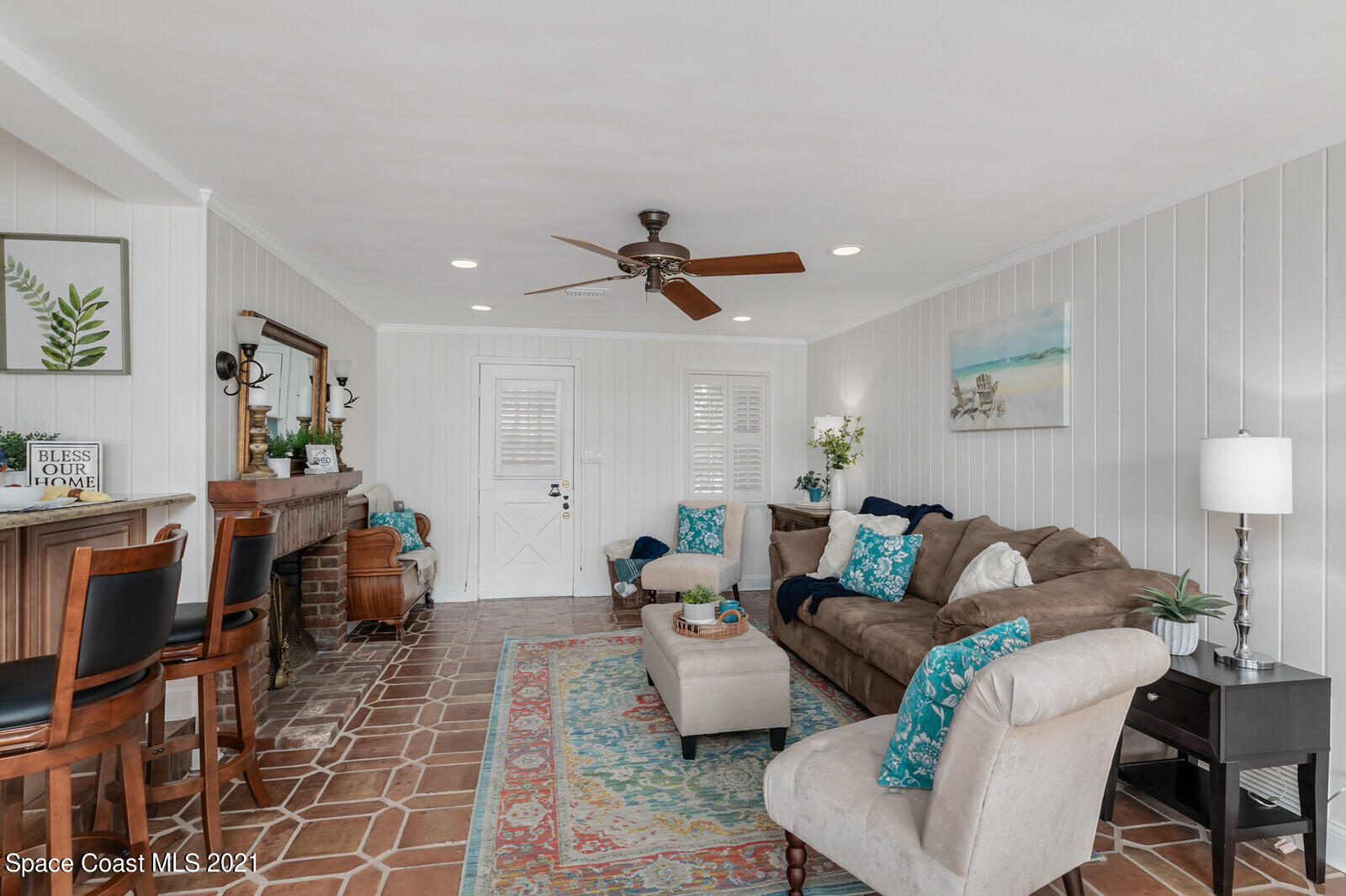 200 Melbourne Avenue Indialantic, FL 32903 - Photo 29 of 62 a living room with furniture and a ceiling fan